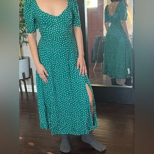 Beautiful green cottage style dress with two slits in the front